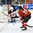 KAMLOOPS, BC - APRIL 1: Japan's Nana Fujimoto #1 makes a save while Switzerland's Christine Hueni #19 looks on during relegation round action at the 2016 IIHF Ice Hockey Women's World Championship. (Photo by Matt Zambonin/HHOF-IIHF Images)

